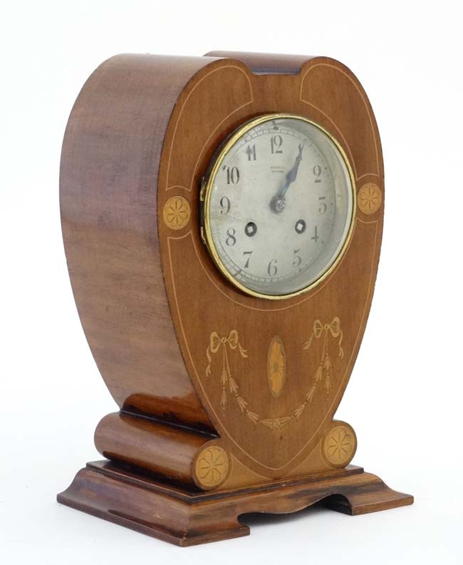 Rowell Oxford : a signed Art Nouveau shaped case inlaid mahogany mantle clock,