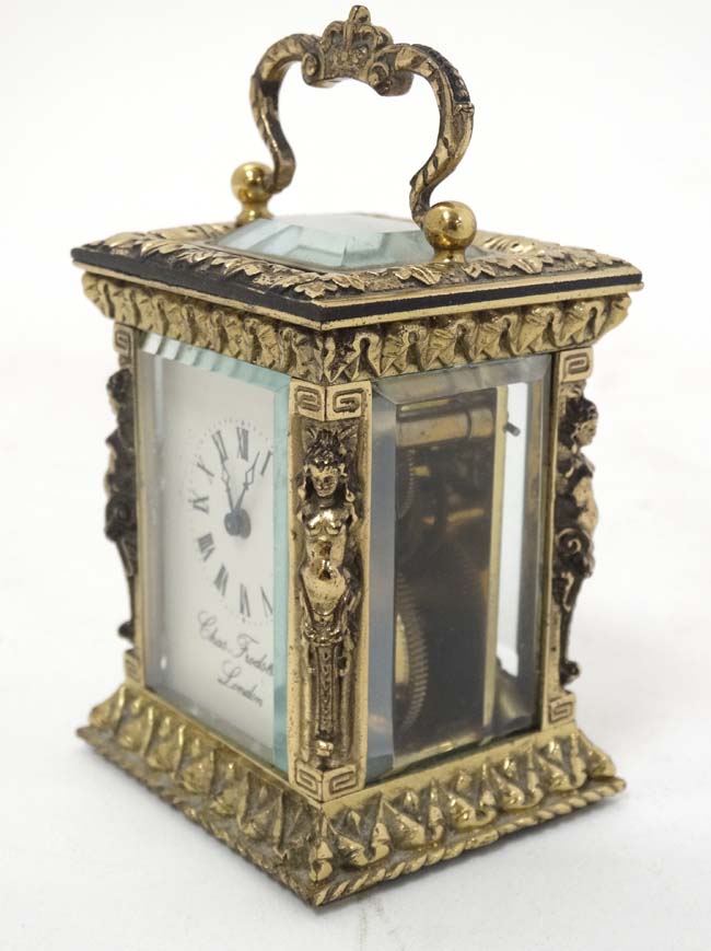 A 19thC Gilt brass ' Chas Frodsham ' Carriage Clock : an ornate cast and chased 5 bevelled glass - Image 4 of 11