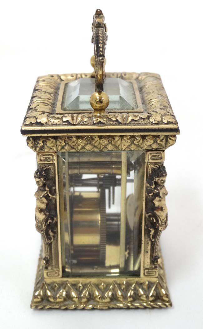 A 19thC Gilt brass ' Chas Frodsham ' Carriage Clock : an ornate cast and chased 5 bevelled glass - Image 7 of 11