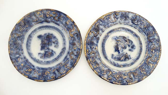 A pair of late 19thC flo blue wall chargers with gilt detail, having dragon detail to surround,