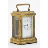 Miniature Carriage Clock : an early - mid 20thC 5 bevelled glass miniature brass cased ,