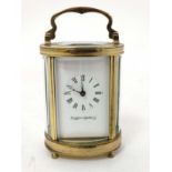 Oval Miniature Mappin & Webb Ltd Carriage Clock : a 4 shaped and bevelled glass with oval bevelled