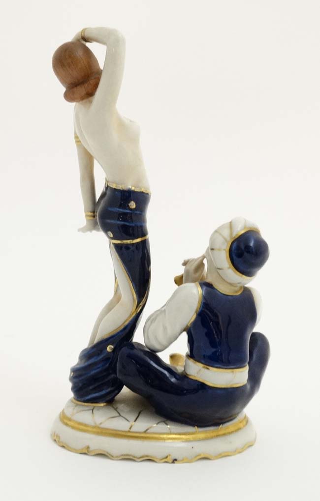 A Royal Dux Art Deco figure group depicting a half naked female in exotic dance pose while a - Image 4 of 6