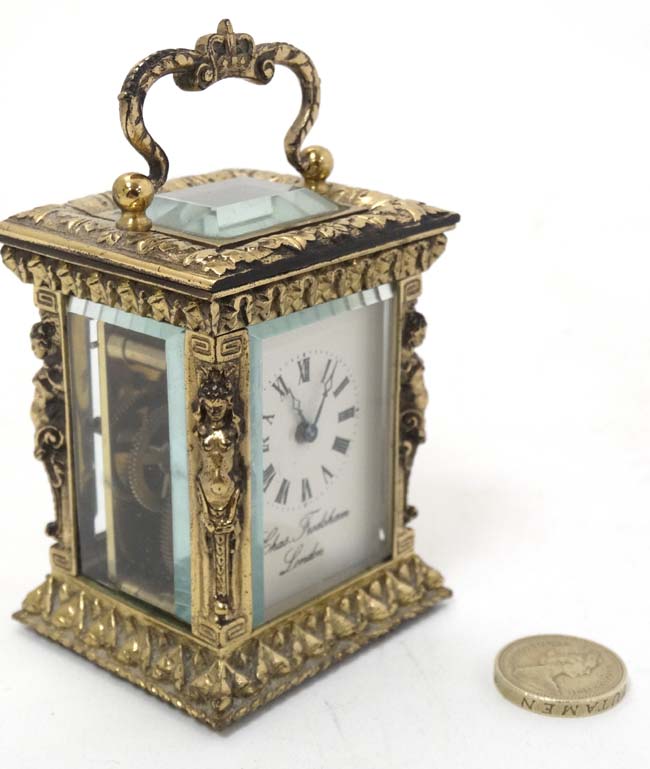 A 19thC Gilt brass ' Chas Frodsham ' Carriage Clock : an ornate cast and chased 5 bevelled glass - Image 5 of 11