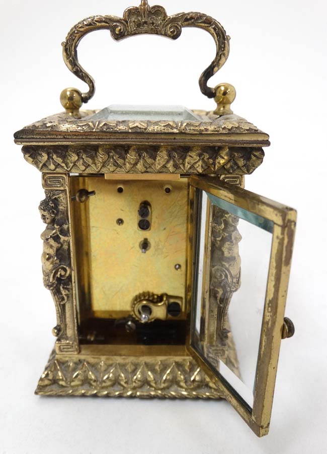 A 19thC Gilt brass ' Chas Frodsham ' Carriage Clock : an ornate cast and chased 5 bevelled glass - Image 9 of 11