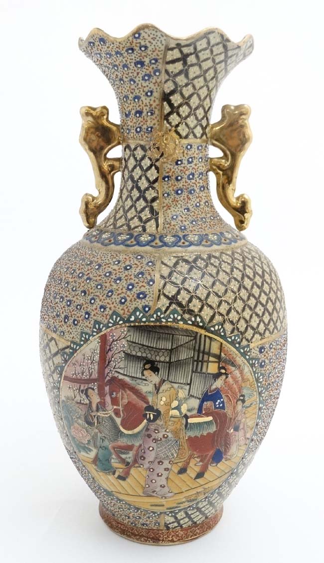 A large two handled Japanese style ruffled rim vase,