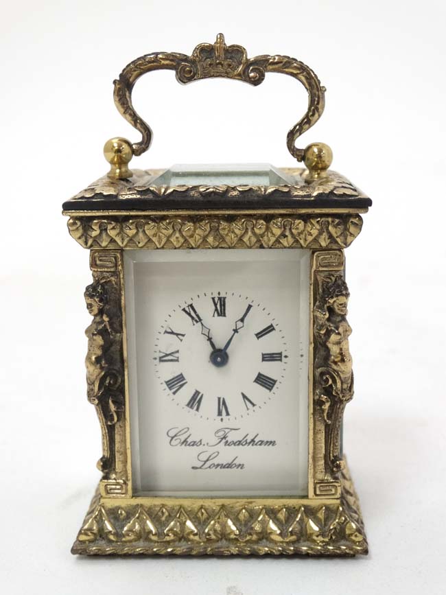 A 19thC Gilt brass ' Chas Frodsham ' Carriage Clock : an ornate cast and chased 5 bevelled glass