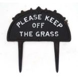 A 21stC painted cast metal 'Keep off the grass' sign with spike to base CONDITION: