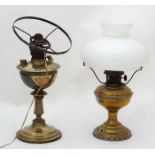 2 brass lamps CONDITION: Please Note - we do not make reference to the condition of