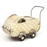 Perambulator: a 1950's Pram with four equal sized wheels, sprung suspension,