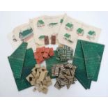 A mid 20thC set of toy building bricks decorated with red herringbone brickwork,