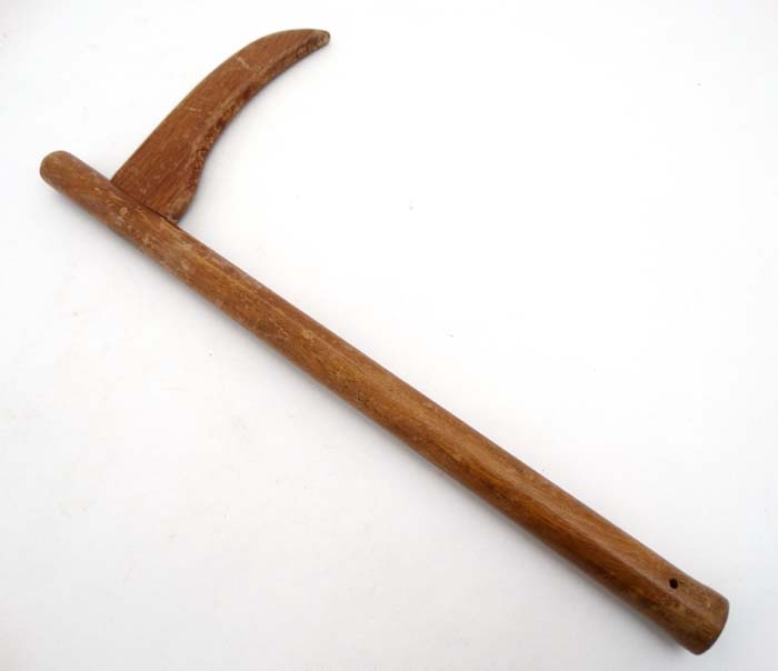 A mid - late 20thC oak thatchers tool.