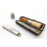 3 assorted items comprising a silver mounted cheroot holder/ mouthpiece.