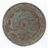 Oriental: Chinese Bronze Mirror : a disc shaped mirror ( now with signs of verdigris ) having