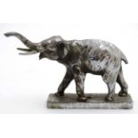 Car Mascot / Hood Ornament : a Louis Lejeune chromed figure of an elephant walking and Trumpeting