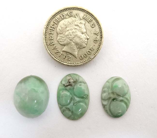 3 Oriental jade cabochon, 2 in the form of lily pads.