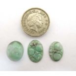 3 Oriental jade cabochon, 2 in the form of lily pads.