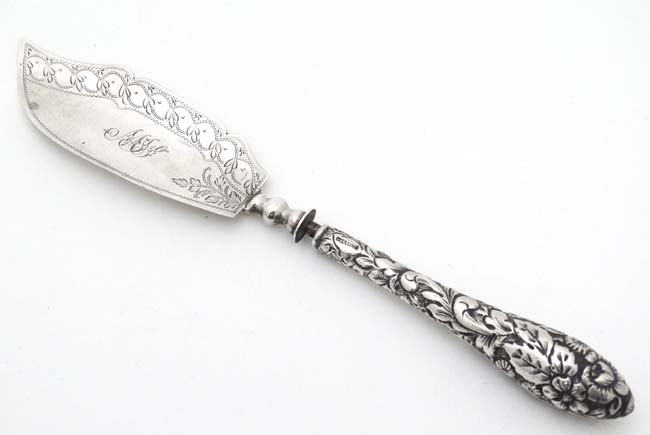 A silver butter knife, the handle marked 'Sterling' the blade hallmarked Birmingham 1825 maker L&Co.