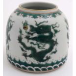 A Chinese green and white brush pot of beehive form decorated with 5 clawed dragons and pearls of