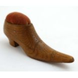 A pin cushion in the form of a wooden brogue shoe 5 3/8" long CONDITION: Please