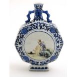 A Chinese blue and white twin handled moon flask,