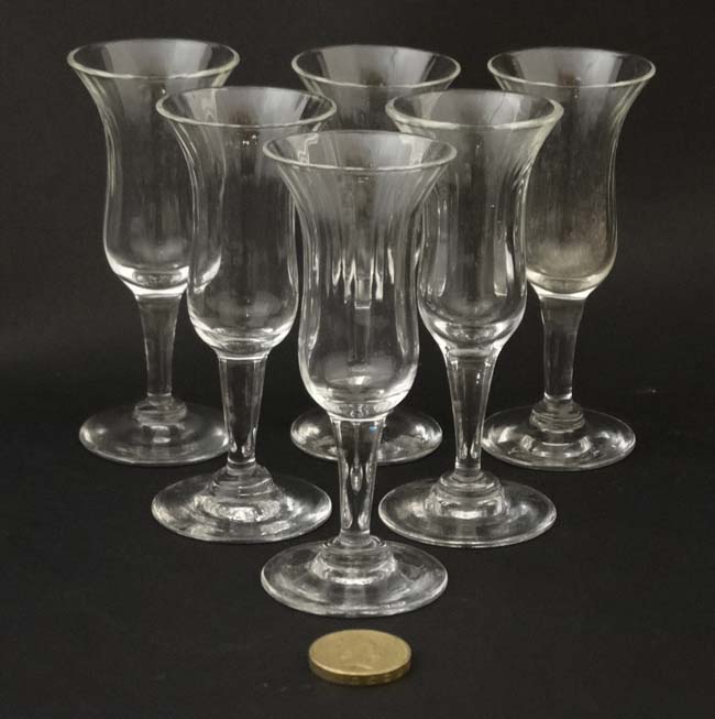 A set of 6 glass pedestal sherry schooners / glasses 4 1/4" high CONDITION: Please