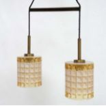 Vintage Retro : a Pair of Scandinavian Pendant lamps / lights With squared relief amber glass