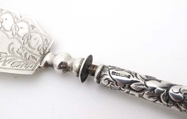 A silver butter knife, the handle marked 'Sterling' the blade hallmarked Birmingham 1825 maker L&Co. - Image 3 of 6