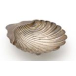 A silver butter / bon bon dish formed as a scallop shell hallmarked Sheffield maker 1898 maker