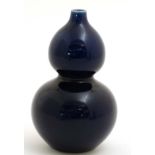 A Chinese royal blue double gourd vase, bears blue Chinese seal mark to base. 8'' high.