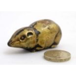 A novelty brass vesta in the form of a mouse with striker under 2 3/8" long CONDITION: