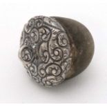 An unusual pedant formed as a stylised guttapercha? acorn with Sterling silver mount ,