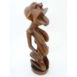 Ethnographica - Native tribal carved wooden figure of a female with mortar and pestle 21 3/4" high