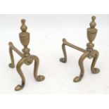 Firedogs : a pair of cast brass urn topped fire dogs c.