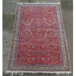 Carpet / Rug : a finely woven woollen carpet with red central ground' ,