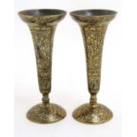 A pair of black enamel sgraffito trumpet vases with spherical feet 8 1/4" high