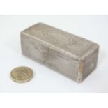 A white metal snuff box with engraved decoration and gilded interior. Indistinctly marked.