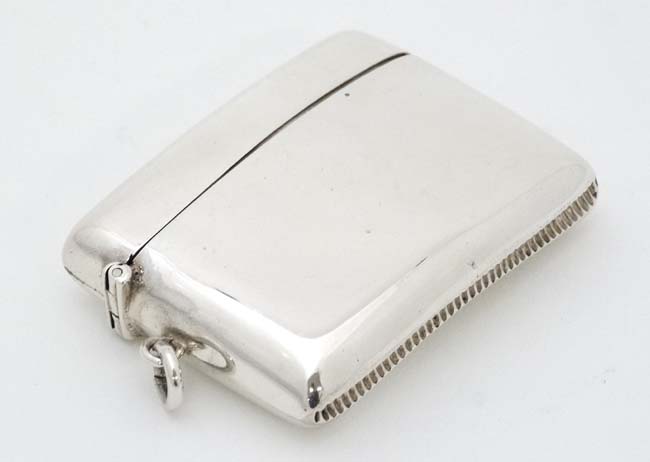 A silver vesta case with unusual 2 sectional interior.
