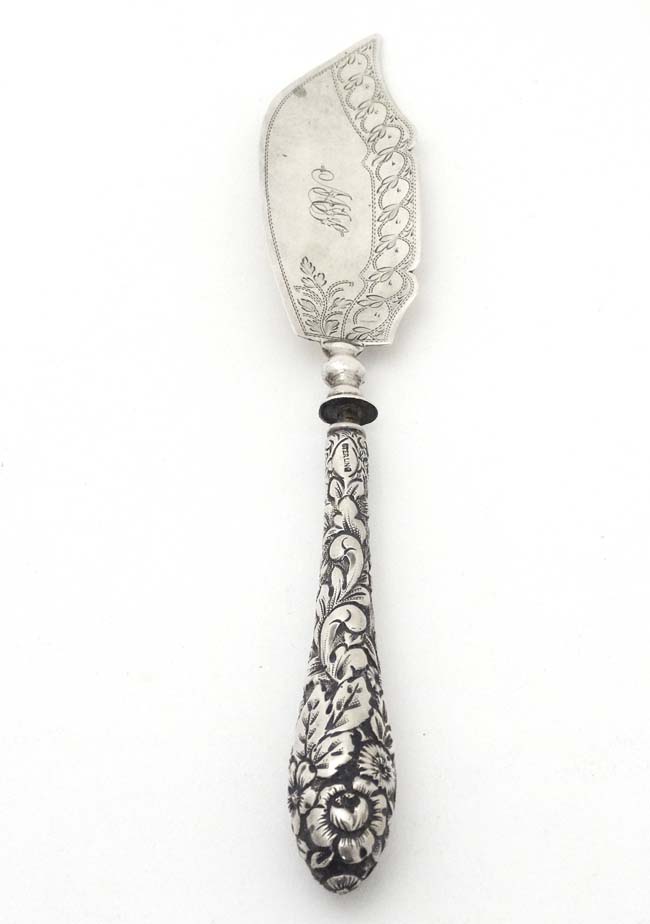 A silver butter knife, the handle marked 'Sterling' the blade hallmarked Birmingham 1825 maker L&Co. - Image 2 of 6