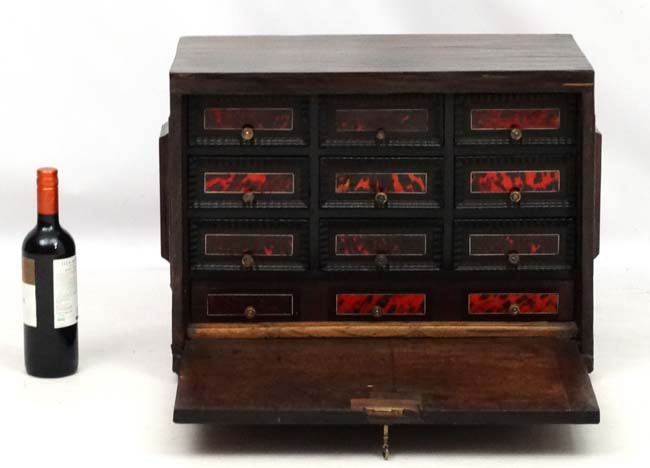 A 17thC/ 18thC Indo-Portuguese Coromandle table cabinet having 9 drawers and one long drawer under - Image 4 of 4