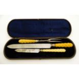 A carving set (boxed) CONDITION: Please Note - we do not make reference to the