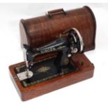 Cased Singer Sewing Machine CONDITION: Please Note - we do not make reference to