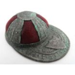 A reproduction brass jockey cap pin cushion CONDITION: Please Note - we do not make