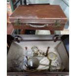 Leather suit case having glass candle holders,