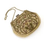A Ladies c1920's evening bag, gold wire work embroidery on a cream grosgrain background.