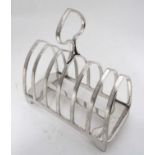 A six division silver plated toast rack CONDITION: Please Note - we do not make