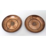 HMS Columbo : A pair of copper dishes featuring the insignia of HMS Columbo .