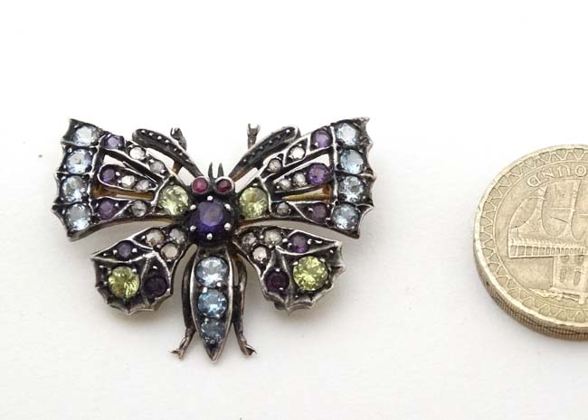 A yellow and white metal brooch formed as a butterfly set with a profusion of stones including - Image 3 of 4