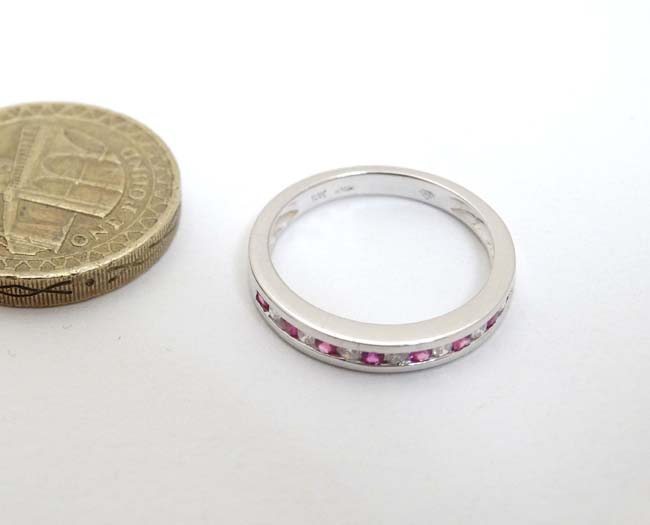 An 18ct white gold diamond and ruby half eternity ring CONDITION: Please Note - we - Image 3 of 4