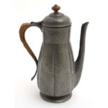 Art Nouveau : BCM / Tudric - A plannished melon sided pewter coffee pot with caned handle,